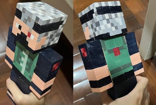 ethoslab minecraft skin statue made by painted wood blocks, showing both the front and back
